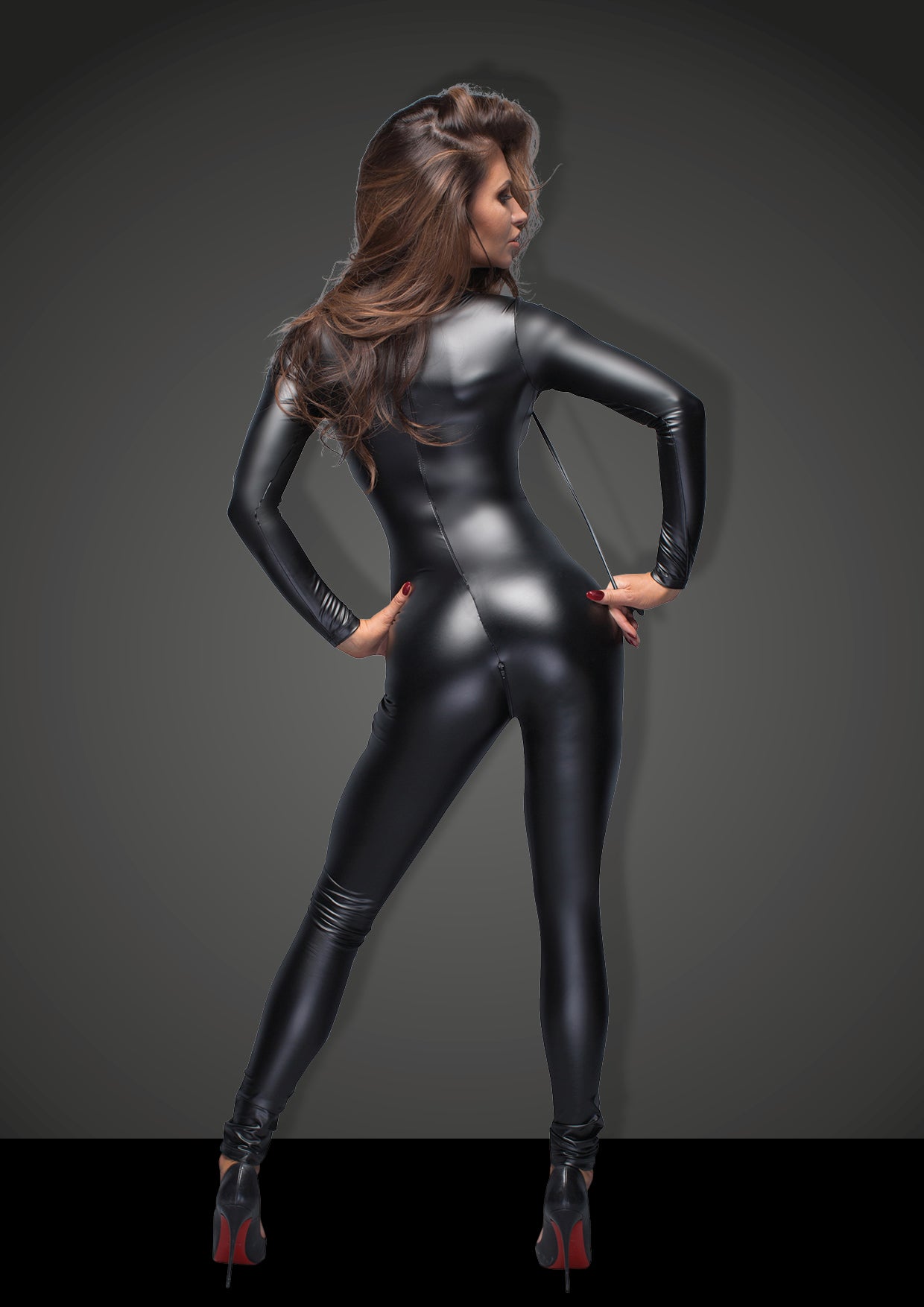 modell wearing black Catsuit with leash back view