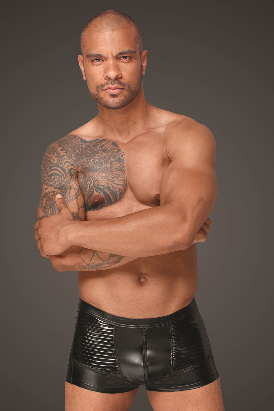 man wearing Wetlook Men's Shorts with Decorative PVC pleats front view